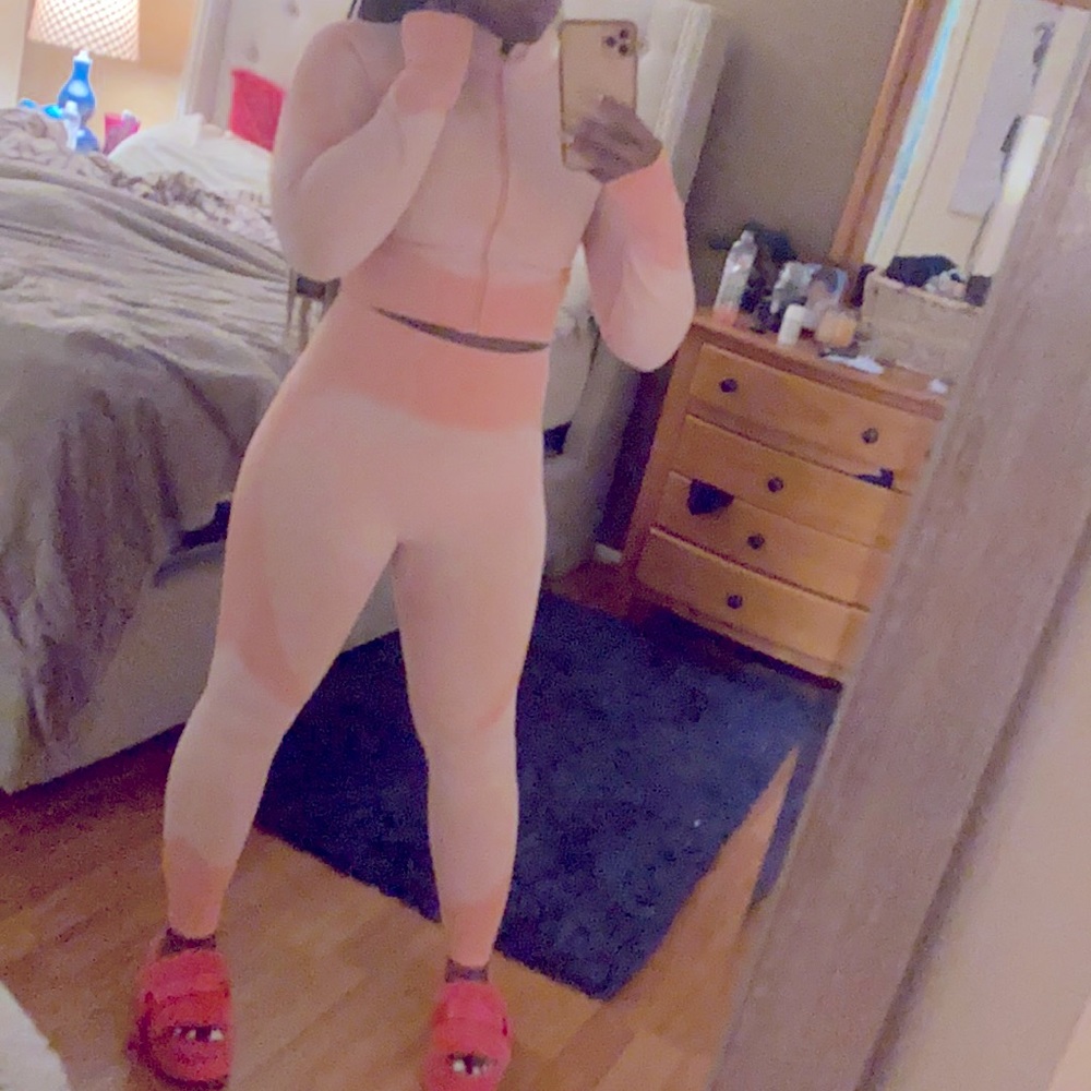Pink tights and pink top.